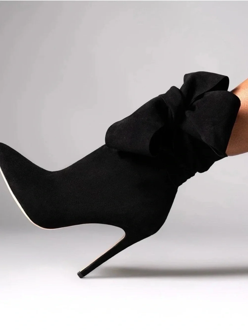 Aminah Abdul Jillil elegant black